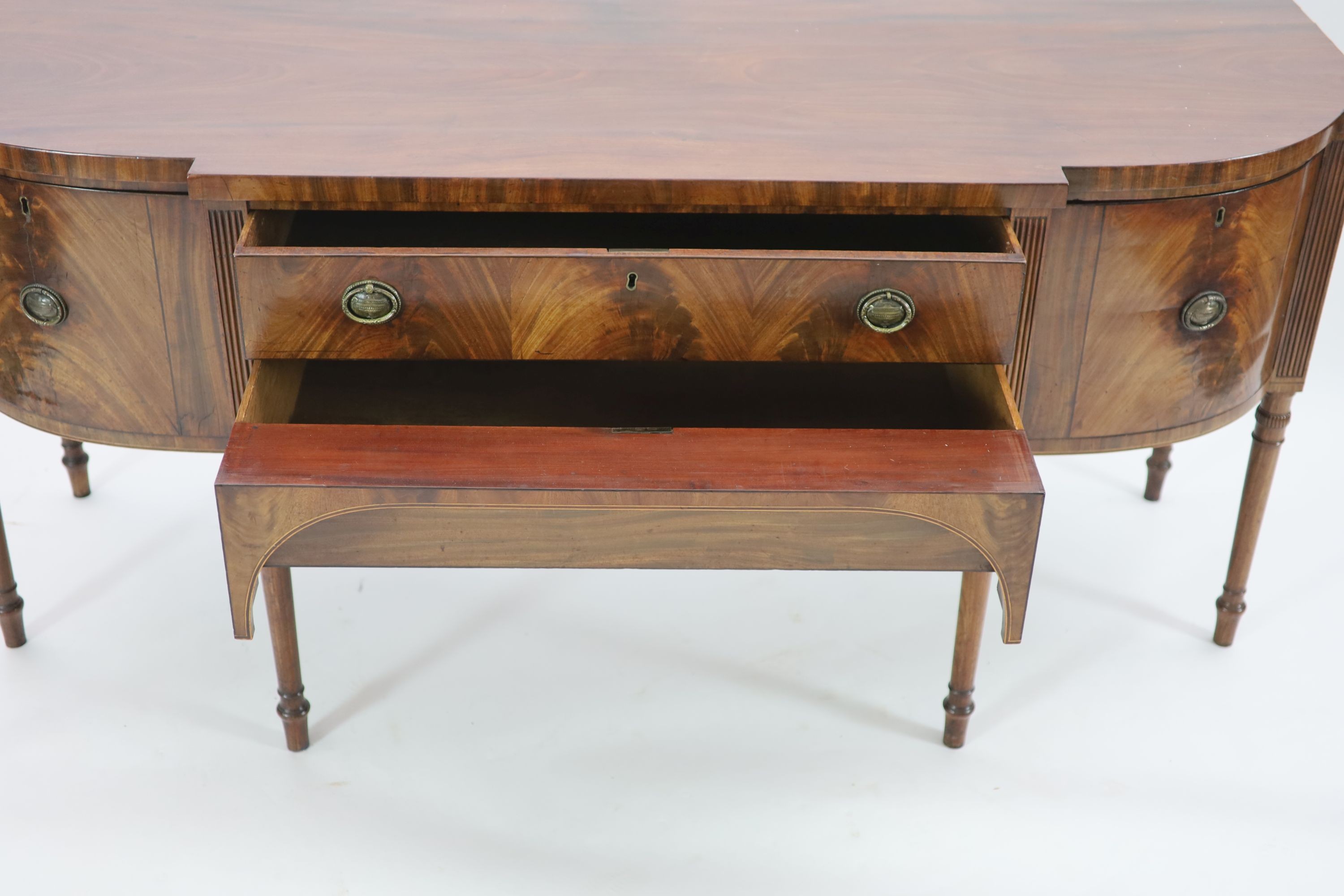 A large George III mahogany breakfront sideboard, W.199cm D.74cm H.93cm